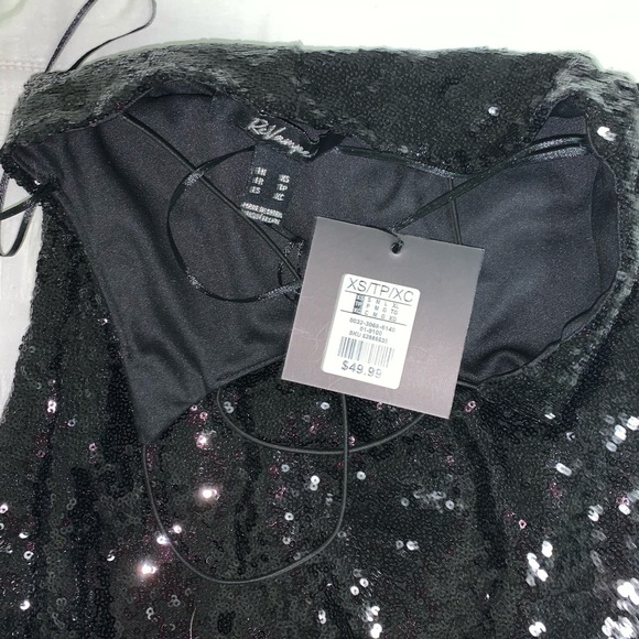 Black sequins party dress. Size xs but fits a bit tighter in the upper chest. - Picture 3 of 4